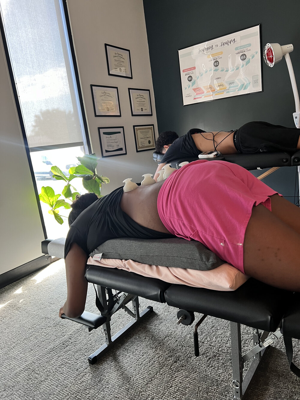 Chiropractic table adjustment at WholeCare Wellness Collective Marietta